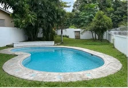 Vendo Terreno con Piscina y Gran Jardín en Zona 3 de Escuintla