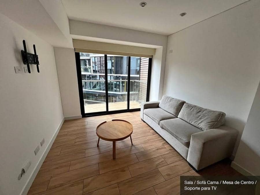 En renta apartamento semi amueblado en zona 4 edificio Quo
